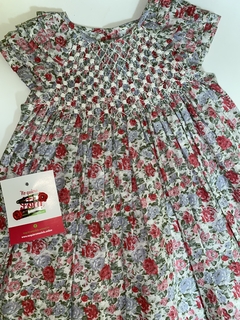 Vestido floreado amplio con smock. talle 1/2 años