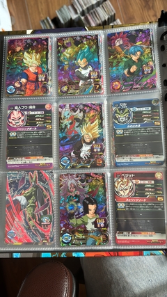 671 cartas de dragon ball héroes + 26 packs sellados Vjump + 100 slaves + binder con 25 micas en internet