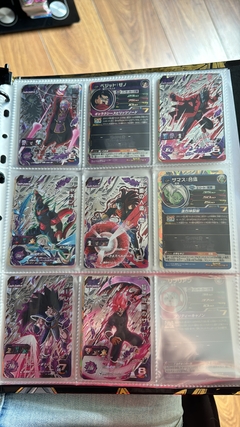 671 cartas de dragon ball héroes + 26 packs sellados Vjump + 100 slaves + binder con 25 micas