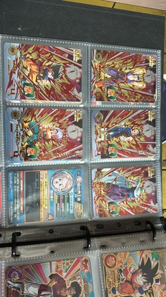 671 cartas de dragon ball héroes + 26 packs sellados Vjump + 100 slaves + binder con 25 micas en internet