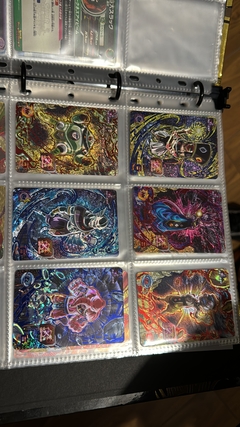 671 cartas de dragon ball héroes + 26 packs sellados Vjump + 100 slaves + binder con 25 micas en internet