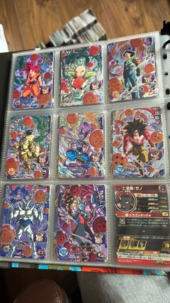 671 cartas de dragon ball héroes + 26 packs sellados Vjump + 100 slaves + binder con 25 micas