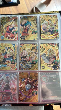 Imagen de 671 cartas de dragon ball héroes + 26 packs sellados Vjump + 100 slaves + binder con 25 micas