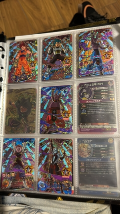 671 cartas de dragon ball héroes + 26 packs sellados Vjump + 100 slaves + binder con 25 micas