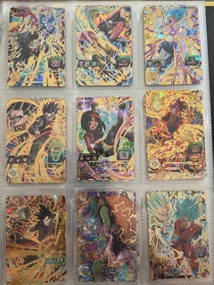 671 cartas de dragon ball héroes + 26 packs sellados Vjump + 100 slaves + binder con 25 micas - Gamebusters