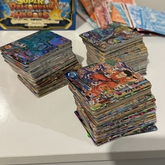 Imagen de 671 cartas de dragon ball héroes + 26 packs sellados Vjump + 100 slaves + binder con 25 micas