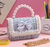 Bolsa perlas con moño en internet