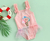Traje de baño rosa estampado nieve