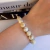Pulseira Bolinhas Off e Tons de Marrom Marmorizado com Elástico - comprar online
