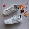 zapatilla cuerina con estrellas