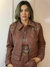 Conjunto jaqueta e shorts em suede ilhós na internet