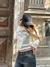 BUZO CROP FRISADO "SAINT.." en internet