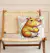 almohadon capybara