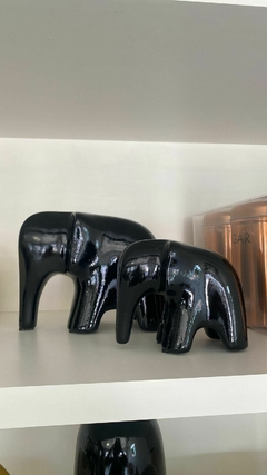 FAMILIA DE ELEFANTE PRETO BRILHO na internet