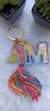letra arco iris , tassel e pingente
