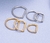 Argola D ring em titânio PVD GOLD cravejada na internet