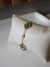 Pulseira Flor Madre Pérola Verde - Dourada na internet