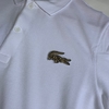 POLO LACOSTE CROC DOURADO