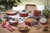 Conjunto de Panelas 10 Peças Tramontina Turim com Revestimento Antiaderente Starflon T1, Tampas de Vidro e Cabos de Baquelite - Vermelho - comprar online