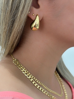 Choker dupla correntaria banhada a ouro 18k na internet