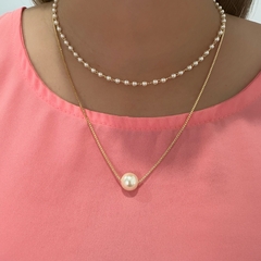 Colar com pérola banhado a ouro 18k na internet