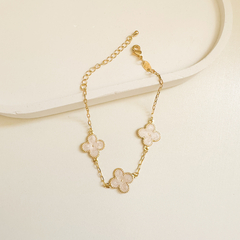 Conjunto Trevo bege banhado a ouro 18k - comprar online