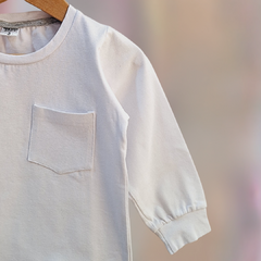 REMERA BOLSILLO BEBE BLANCA en internet