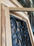 Puerta una hoja de PINOTEA con reja 2 arandelas