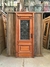 Puerta simple de PINO BRASIL reja 2 arandelas