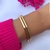 Bracelete Geométrico Vazado Folheado a Ouro 18k.