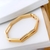 Bracelete Geométrico Vazado Folheado a Ouro 18k.
