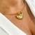 Aro Liso com Coração Folheado a Ouro 18k.