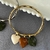 Bracelete Ondulado com Corações Neutros Folheado a Ouro 18k.