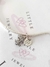 Charm Dinosaurio Brillos con Mariposa en internet