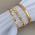 MIX BRACELETE ONDULADO + BRACELETE BRILHANTE + BRACELETE COM DETALHES