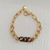 PULSEIRA DOURADA COM MARROM