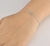 Pulseira com inicial cravejada