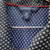 camisa azul marinho com detalhe laranja tommy hilfiger