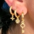 Brinco Argolinha Click Pombinha Banhada a Ouro 18K