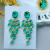Conjunto de Brinco e Anel Oval com Cristais Turmalina Paraiba Banhado a Ouro