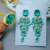 Conjunto de Brinco e Anel Oval com Cristais Turmalina Paraiba Banhado a Ouro