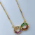 Colar Infinito Cravejado Baguetes Coloridos Banhado a Ouro 18k 