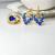 Conjunto de Brinco e Anel Cristais Azul Safira Cravejado Banhado a Ouro