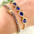 Pulseira Riviera com 5 Cristal Azul Safira  Banhada a Ouro