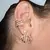 Piercing fake com design de 5 fios cravejados em zircônias incolor banhado a ouro 18k. - comprar online