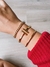 Bracelete T dourado - loja online