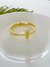 Bracelete T dourado na internet