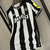 Castore Newcastle United Home 23/24 Torcedor Masculino - Preto - Drip Store | Artigos Esportivos & Snkrs Exclusivos.