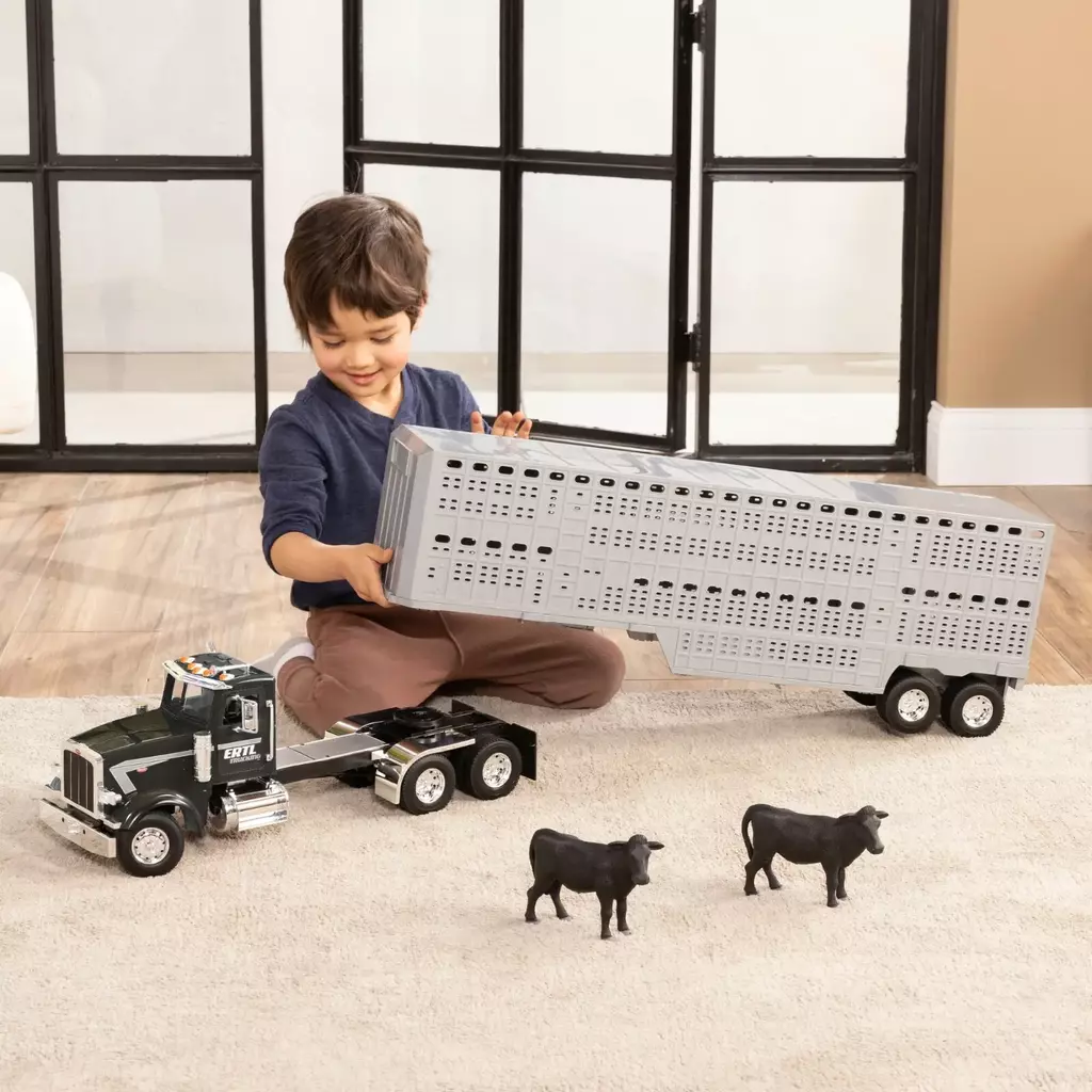 JUGUETE TOMY ESCALA 1:16 TRAILER GANADERO PETERBILT NEGRO GIGANTE CON JAULA GANADO CON LUZ Y SONIDO