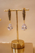 Imagem do Brinco Festa Pêndulo com Gota em Cristal Cravejado com Zircônias Banhado/ Folheado em Ouro 18k e Prata